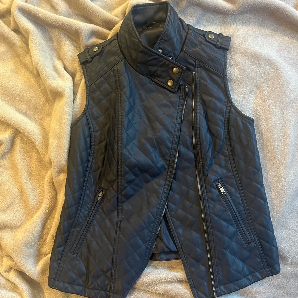 Navy blue quilted vest.